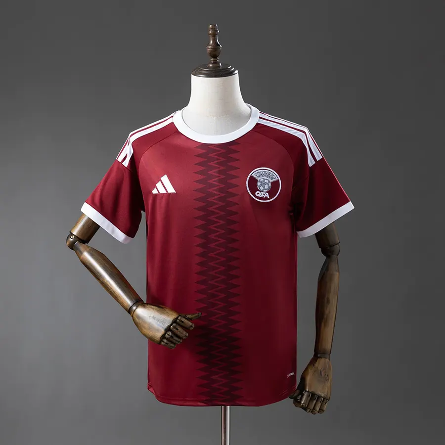 Catar 1º Uniforme Versão Torcedor · 26/27 · Masculino