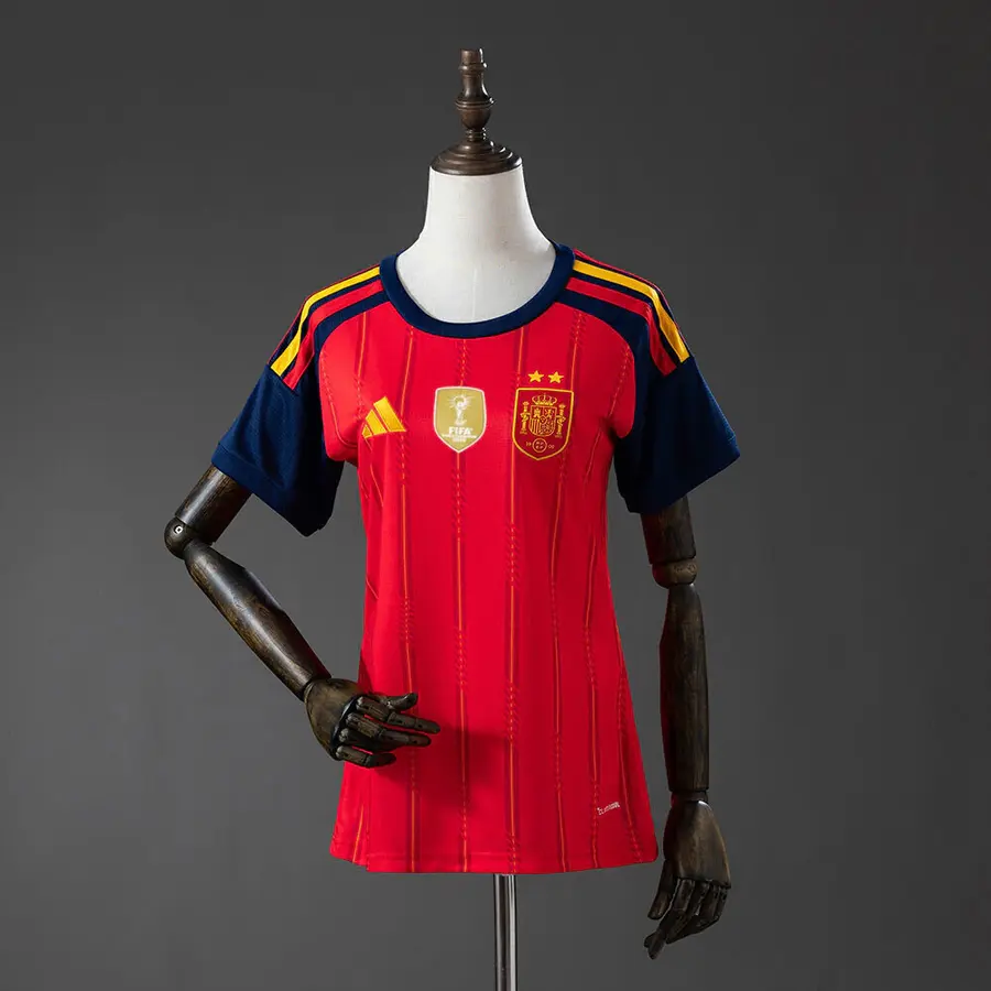 Espanha 1º Uniforme Versão Torcedor · 2 Estrelas · 26/27 · Feminino