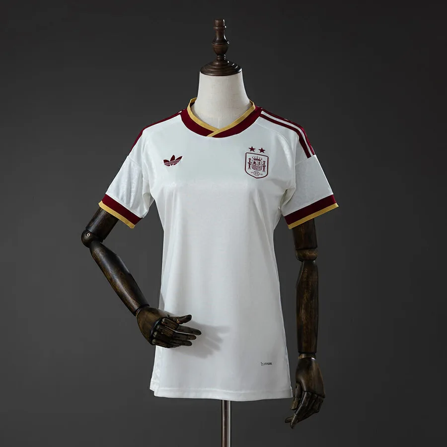 Espanha 2º Uniforme Versão Torcedor · 2 Estrelas · 26/27 · Feminino
