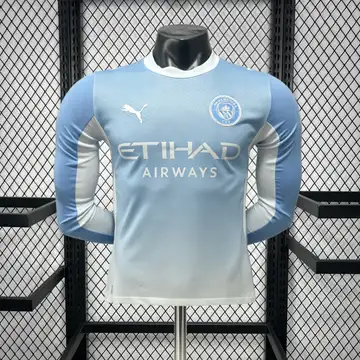 Manchester City 1º Uniforme Versão Jogador · Manga Longa · 26/27 · Masculino
