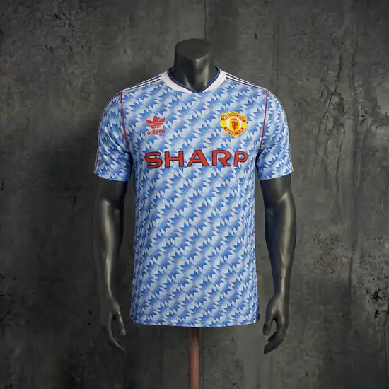 Manchester United 1º Uniforme Versão Jogador · Linha Casual · 26/27 · Masculino